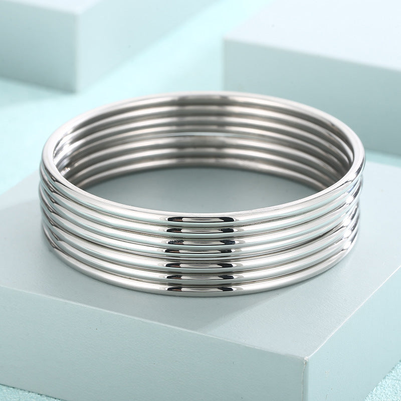 7 bracelets -steel color